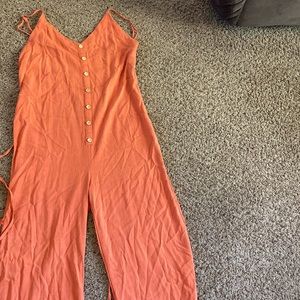 Orange Dillard’s romper, strapless buttons down torso